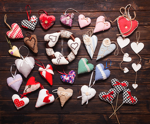 Variety of textile and wooden hearts on the holiday market. Valentine day