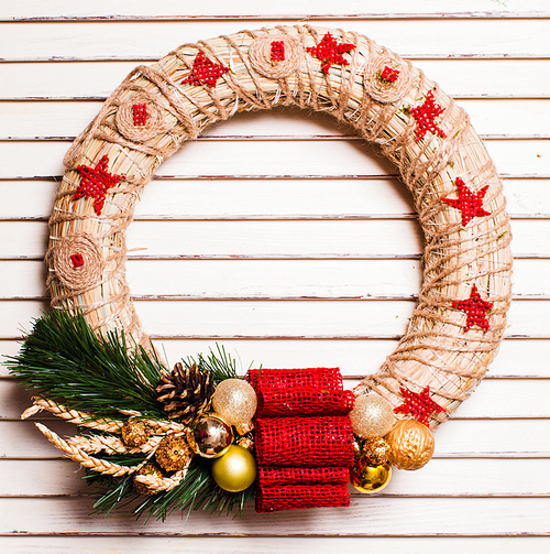 Christmas natural wreath hang on the window