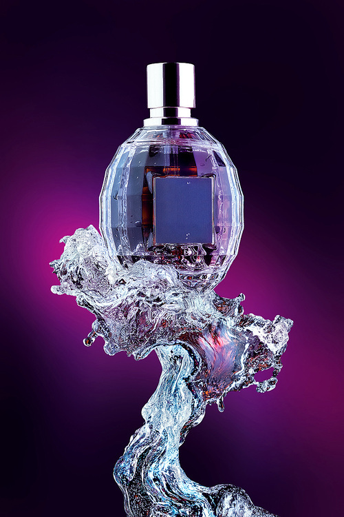 A close-up of a fashionable perfume bottle on the crest of the wave.