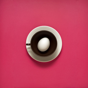 Creative concept photo of kitchenware, painted plate with food on it on pink background.
