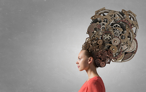 Thinking businesswoman with gear mechanisms on her head