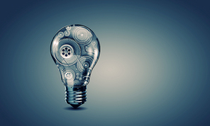 Conceptual image with light bulb filled with gears