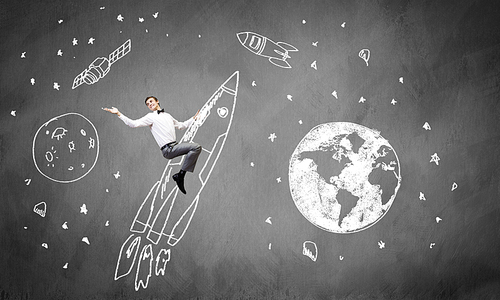 Young businessman,an flying in sky on drawn rocket