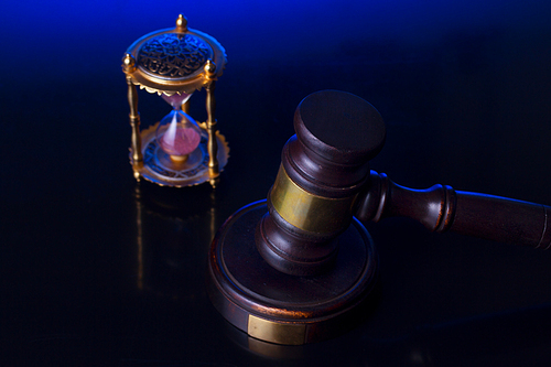 Law and justice concept - law gavel with hourglass