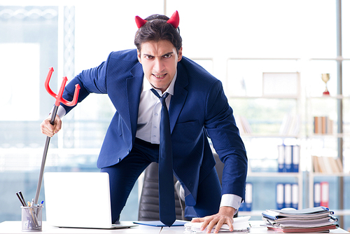 Devil angry businessman in the office