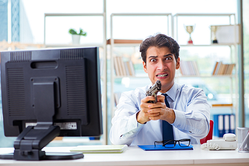 Angry businessman with gun thinking of committing suicide