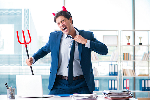 Devil angry businessman in the office