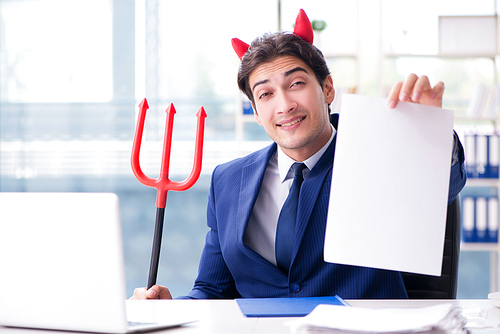 Devil angry businessman in the office