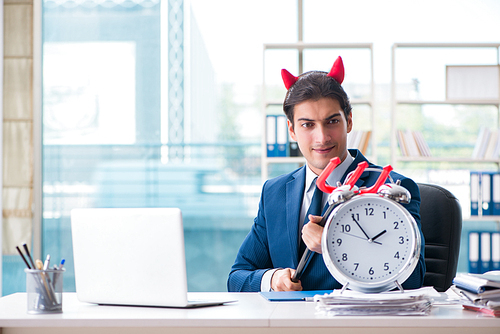 Devil angry businessman in the office