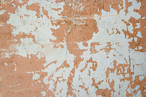 Weathered wall painted  in light brown color