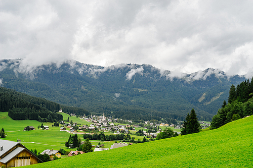 Touristic famous place Gosau, Austria. Picturesque alpine valley and green fields
