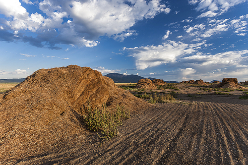 Large piles of fertilizer on the farm field near Rathdrum, Idaho.