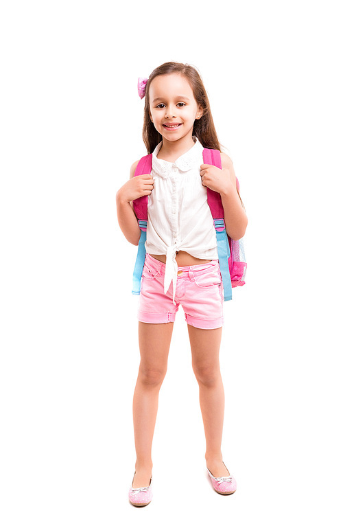 A small student posing isolated over white background