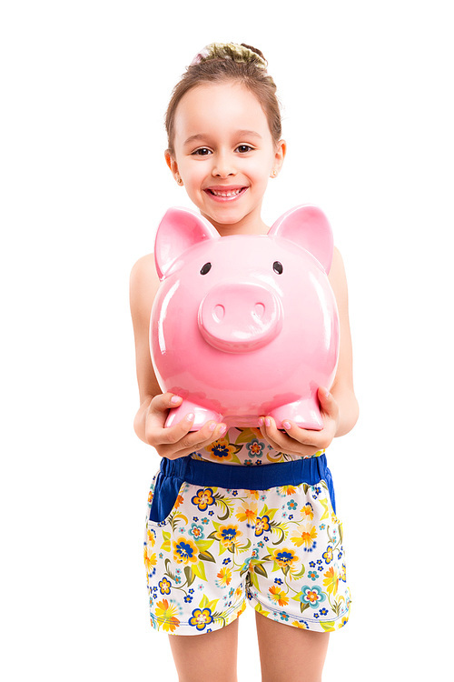 Happy young girl with a new piggy bank to start her savings