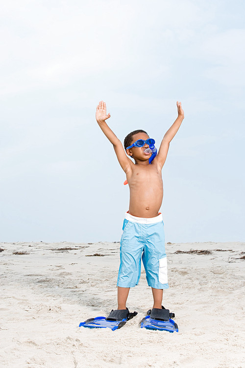 Boy wearing snorkel and flippers