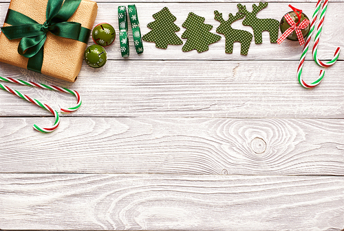 Christmas present and decoration on wooden background
