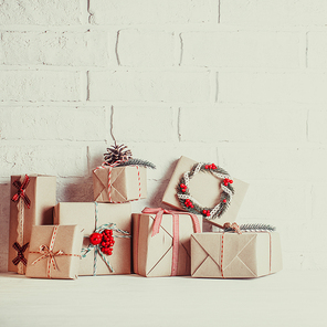 Christmas craft boxes decorated in vintage eco style