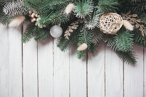 Christmas border design with orange and cotton flowers