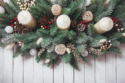 Christmas candlestick on the window, decoration with cones