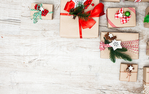 Christmas craft boxes decorated in vintage and natural style, top view with copy space