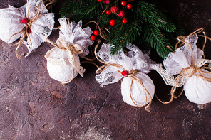 Retro textile Christmas baubles with white lace and rope