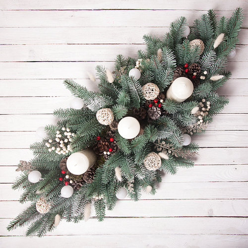 Christmas candlestick on the window, decoration with cones