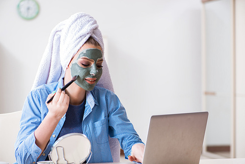 beauty . applying mask and posting to internet blog