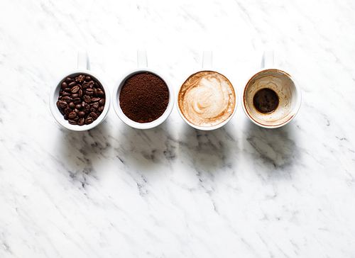 Top view five cups of different stages of preparing cappuccino with copy space