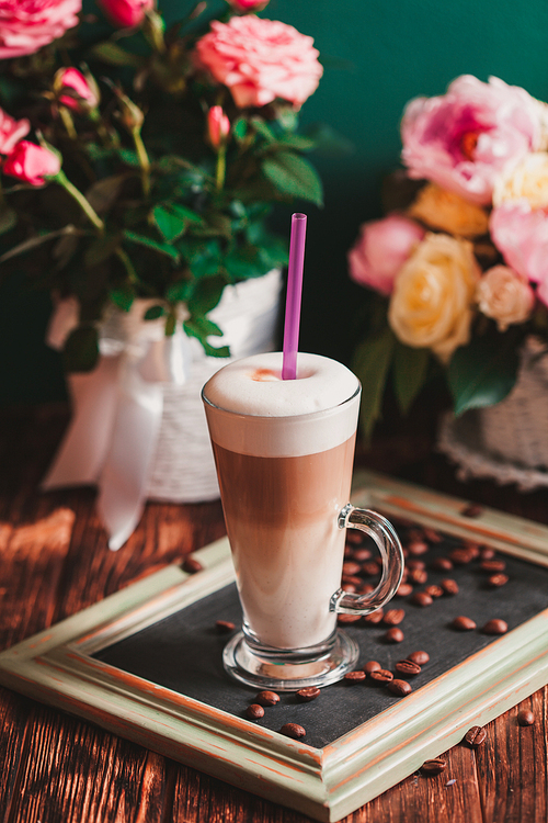 Latte on the chalking board tray, vintage still life