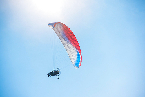 Paragliding in mountains. Para gliders in fight in the mountains, extreme sport activity.