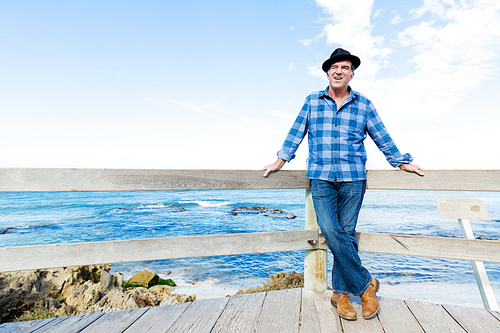 Portrait of an od man next to ocean