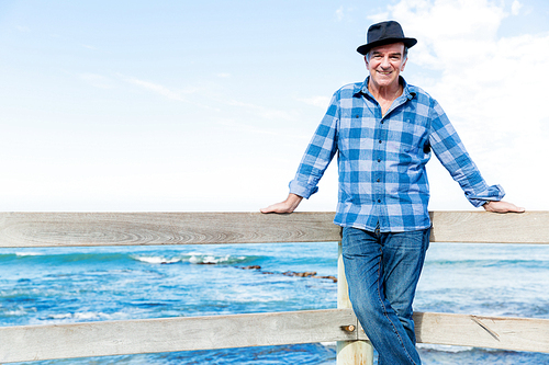 Portrait of an od man next to ocean