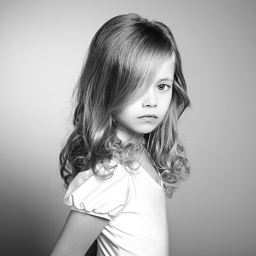 Portrait of pretty little girl. Fashion photo