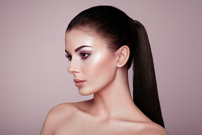 Beautiful Young Woman with Clean Fresh Skin. Perfect Makeup. Beauty Fashion. Eyelashes. Cosmetic Eyeshadow. Highlighting. Cosmetology, Beauty and Spa