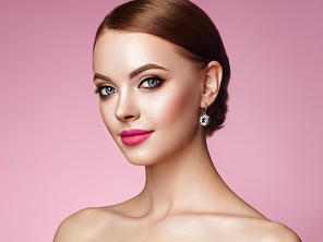 Beautiful Young Woman with Clean Fresh Skin. Perfect Makeup. Beauty Fashion. Eyelashes. Cosmetic Eyeshadow. Highlighting. Cosmetology, Beauty and Spa