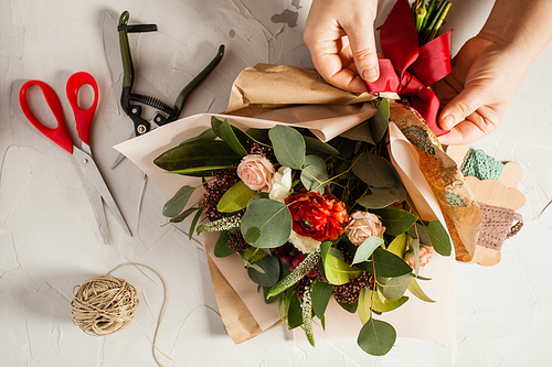 Close up bouquet preparation. Small business concept