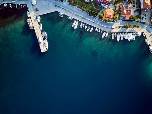 Marina with yachts top aerial view drone shot, Sithonia, Greece