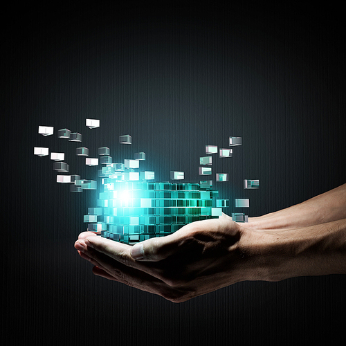 Businessman close view holding in hand magic glowing cube