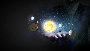 Young businesswoman holding in palm planet of sun system