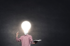 Unrecognizable businessman with light bulb instead of head