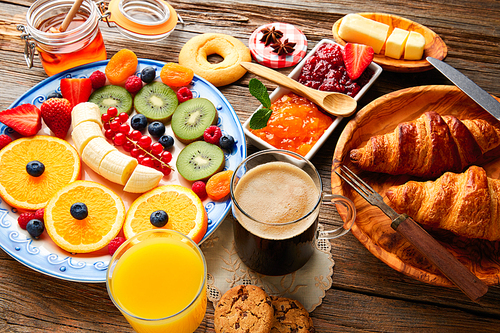 Breakfast buffet healthy continental coffee orange juice fruit salad croissant