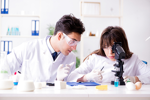 Two lab doctor testing food products