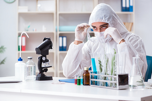 Biotechnology scientist chemist working in lab