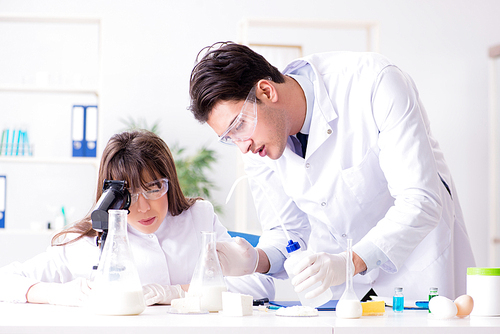 Two lab doctor testing food products