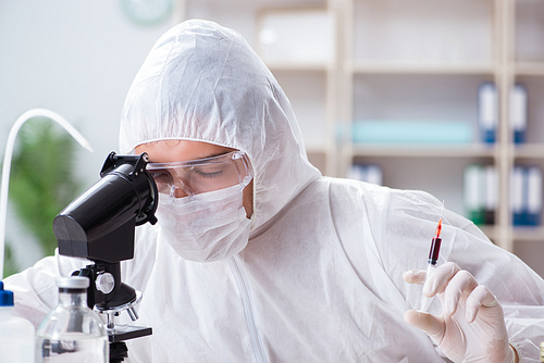 Biotechnology scientist chemist working in lab