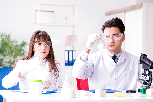 Two lab doctor testing food products