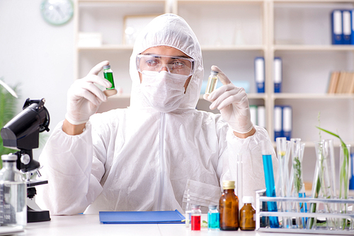 Biotechnology scientist chemist working in lab