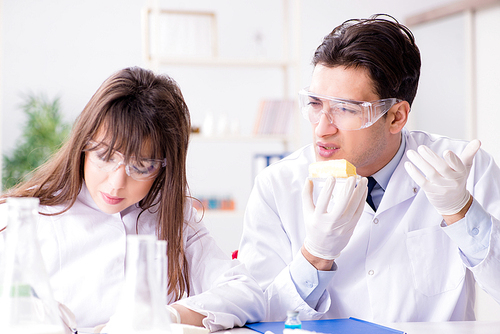 Two lab doctor testing food products