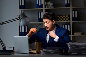 Employee working late to finish important deliverable task