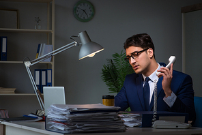 Employee working late to finish important deliverable task